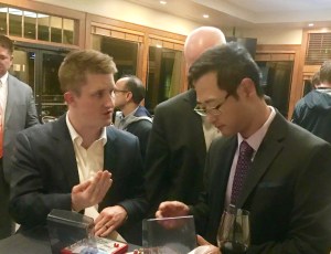 Doctors conversing at a meeting for the Denver Dental Study Club