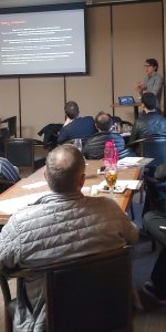 Members sitting at a table learning from the study club